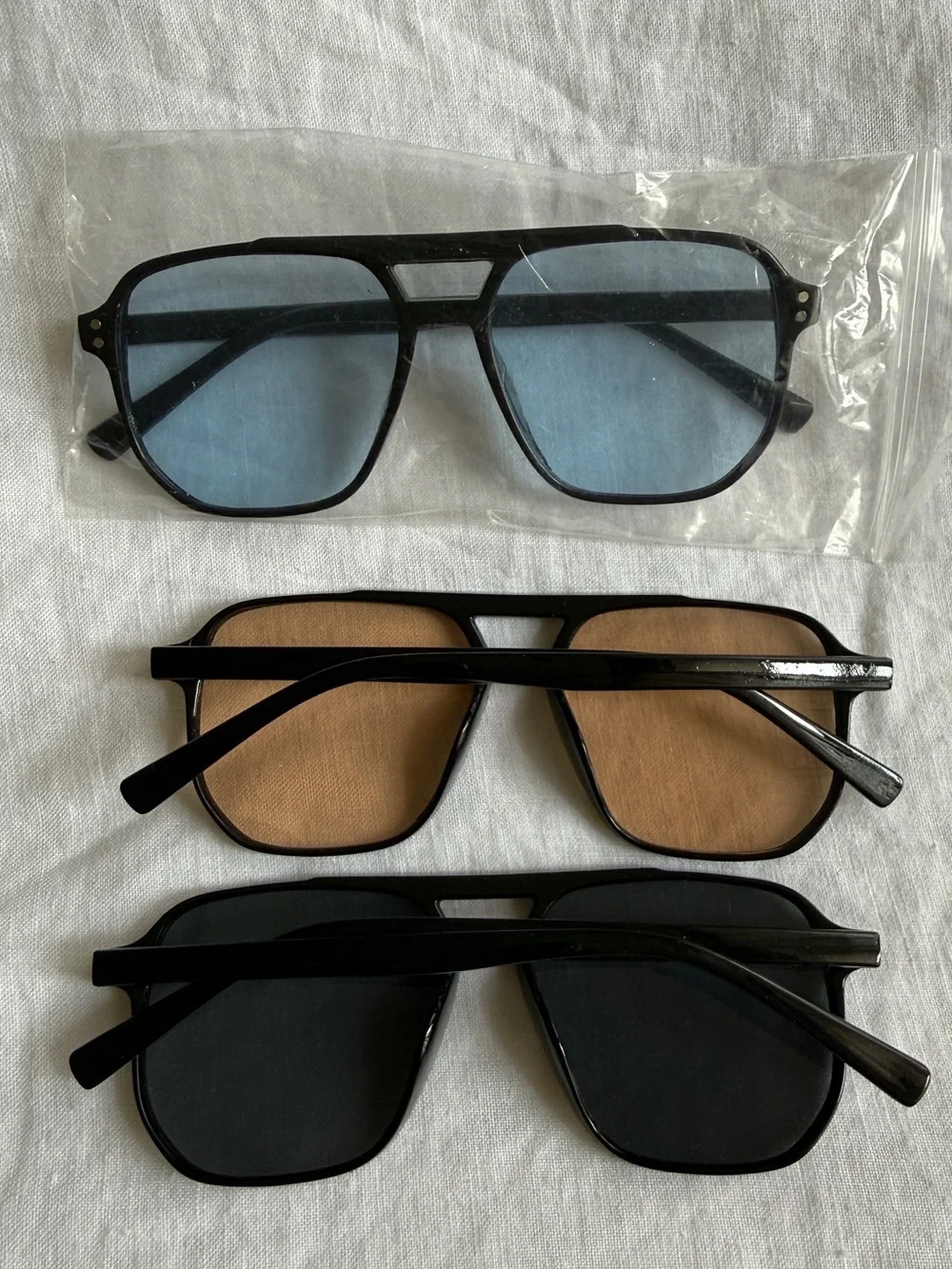 Aviator-Style Black Frame Sunglasses Trio with Brown, Blue, and Black Lenses